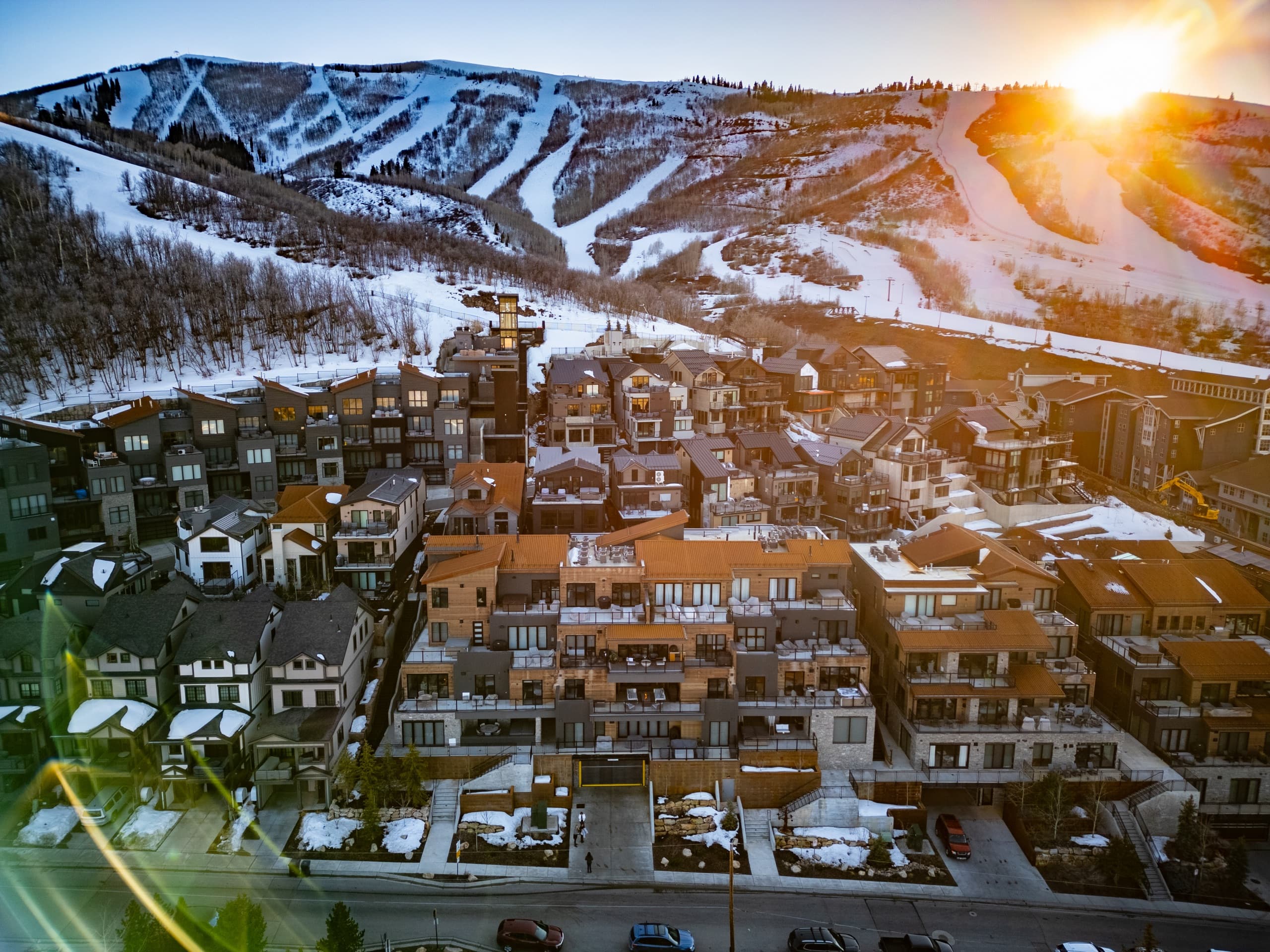 Aerial view of a luxury Park City home and the surrounding mountains
