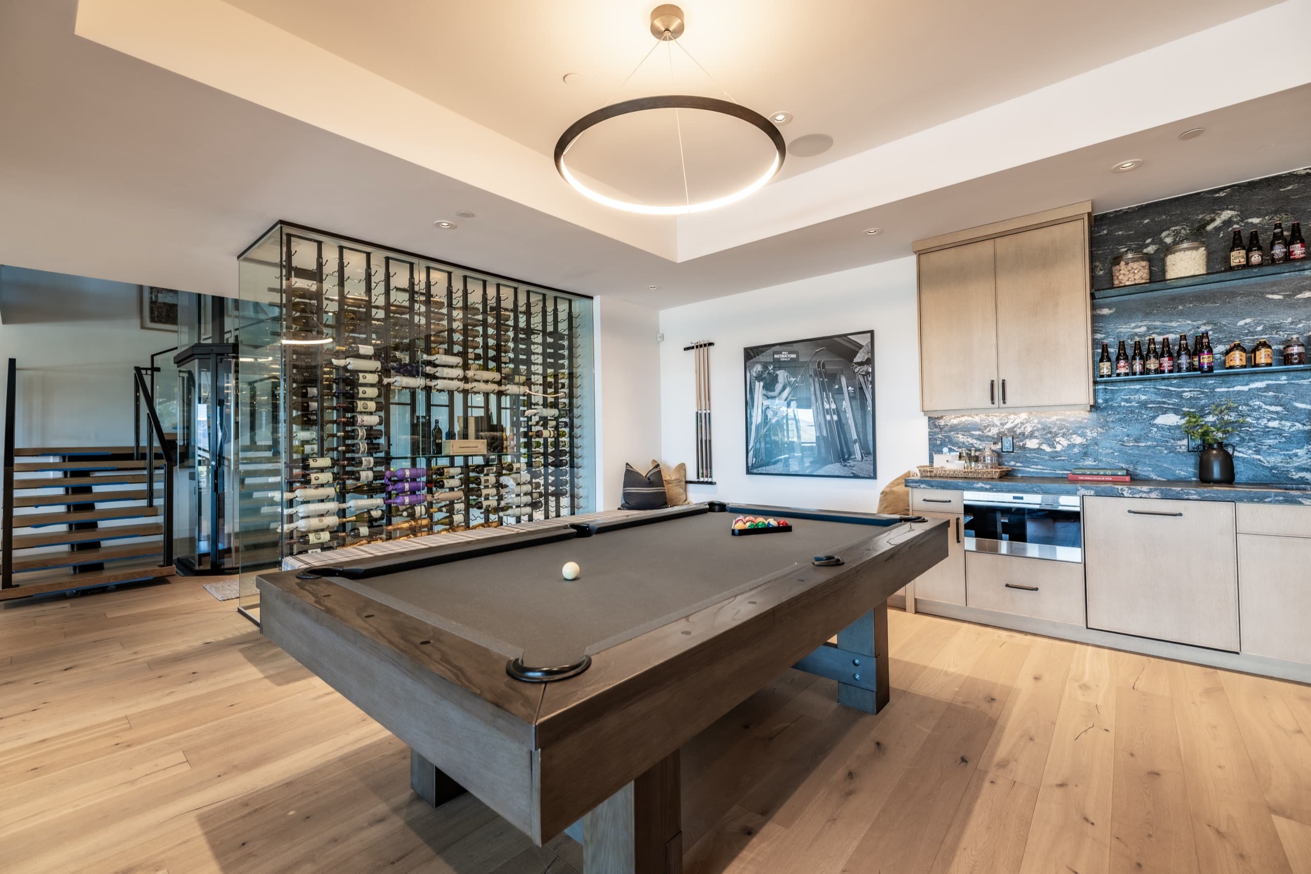 Entertainment room with a wine cellar in a luxury Park City home