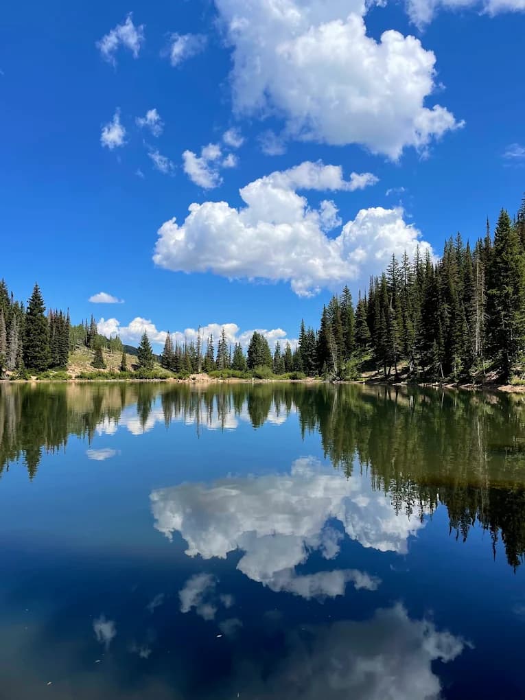 Alpine lake surrounded by mountains near Guardsman Pass