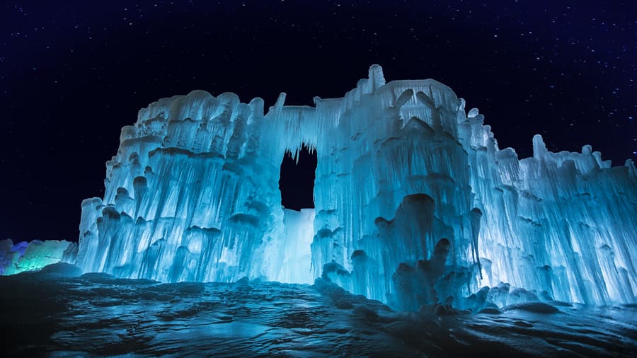Glowing ice castle walls and tunnels in Midway