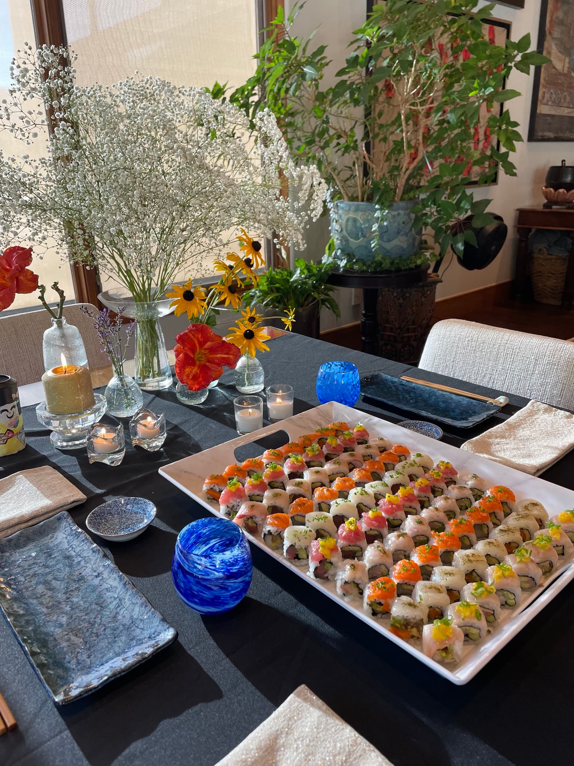 Plated sushi spread on a private dining table